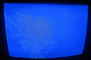 Distorted Windows startup screen recorded on VHS